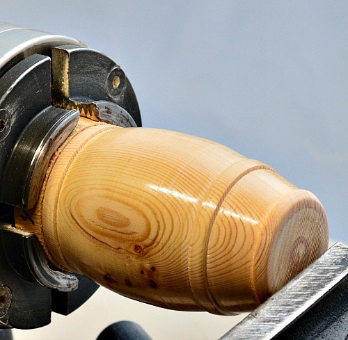 Woodturning bottom of barrel being finished