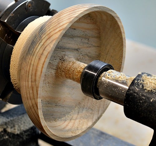 Hollow out the tea light holder ensuring that you have enough wood to support the tea light left.