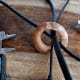 A wooden grommet for your home office computer chords