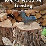 Chopped wood and axe in chopping block