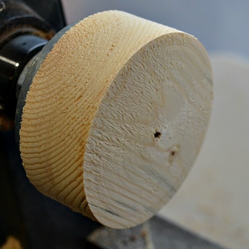 wood on a face plate of lathe