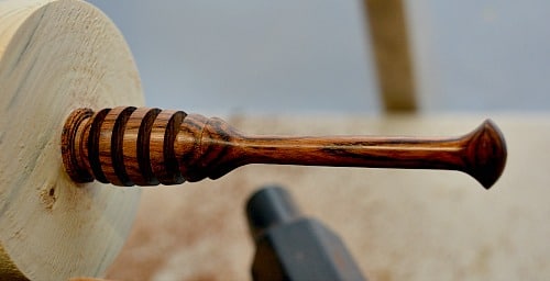 honey dipper on the lathe ready to be removed