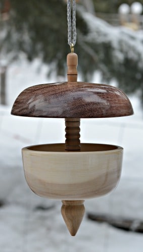 A turned bird feeder is beautiful artisan work.